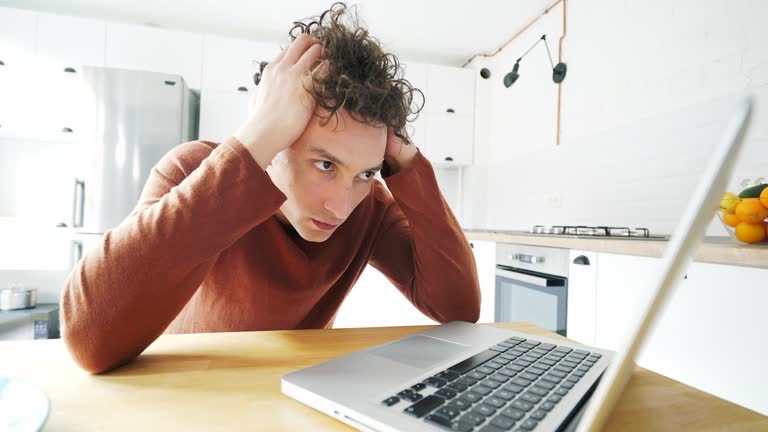 Businessman struggling with emails