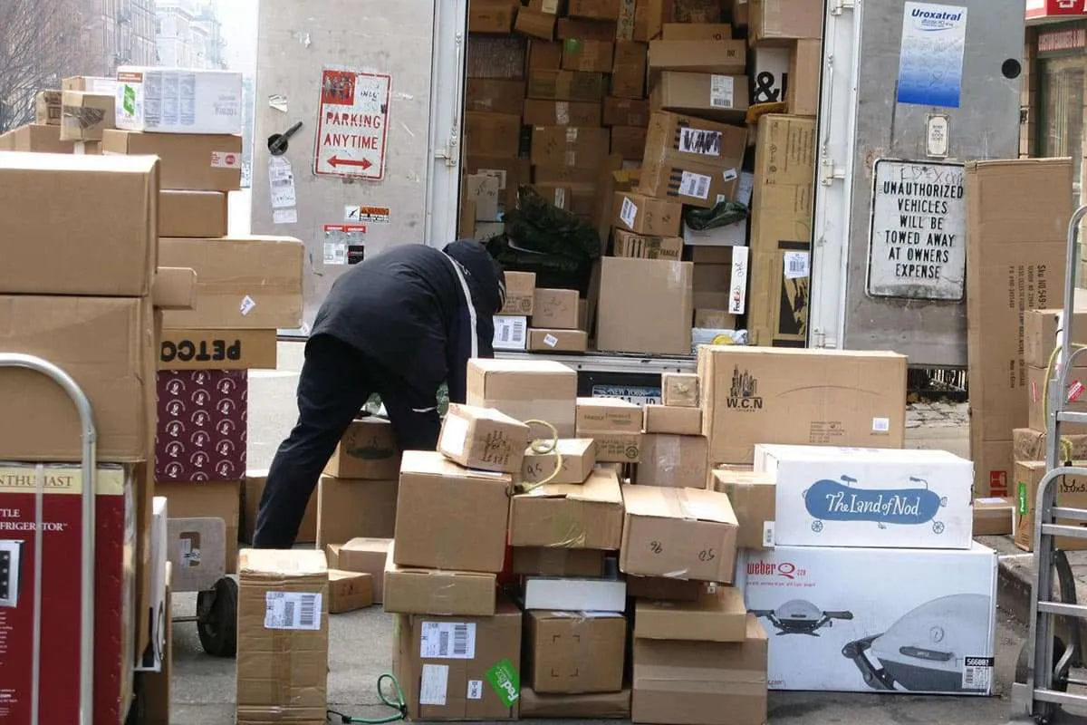 Businessman struggling with paperwork